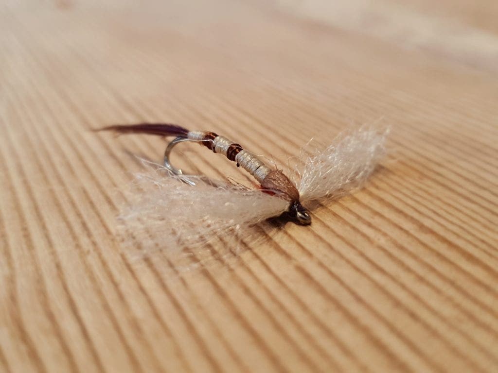 A spent mayfly pattern