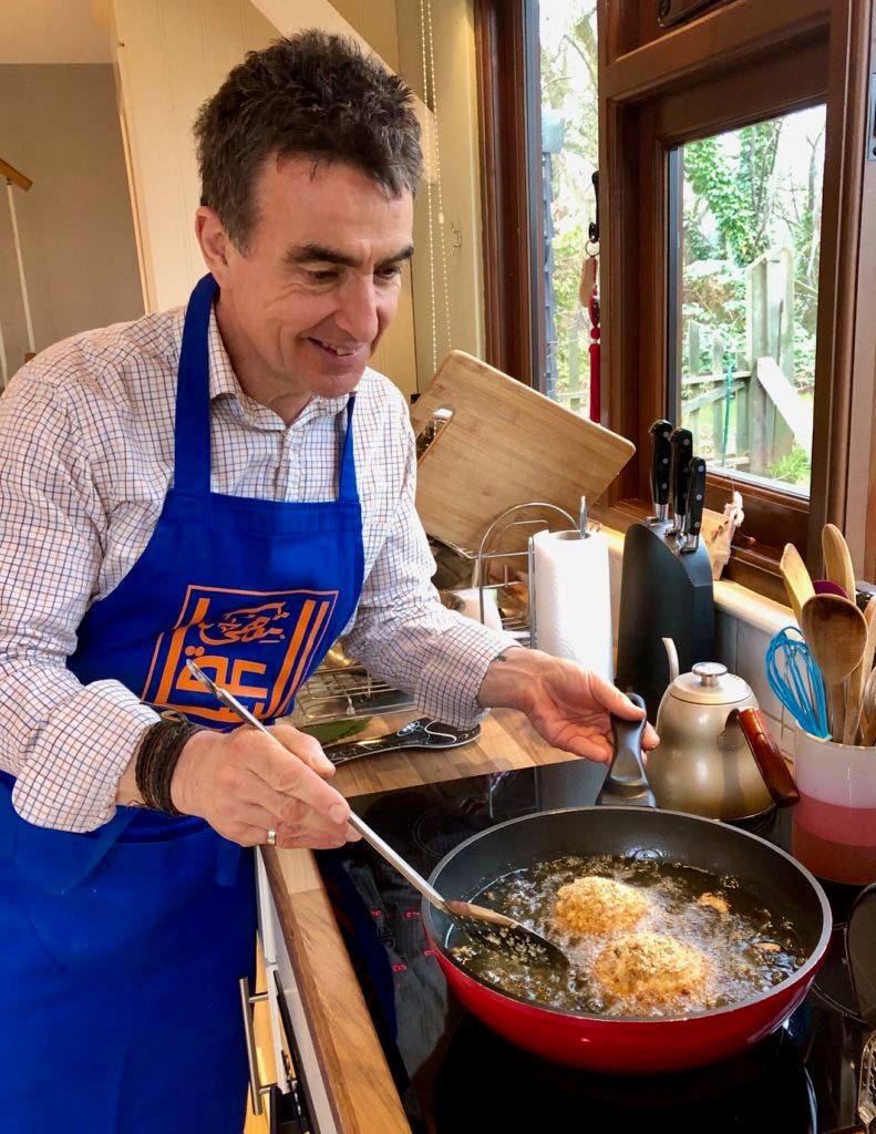 Carefully lower the eggs into the hot oil