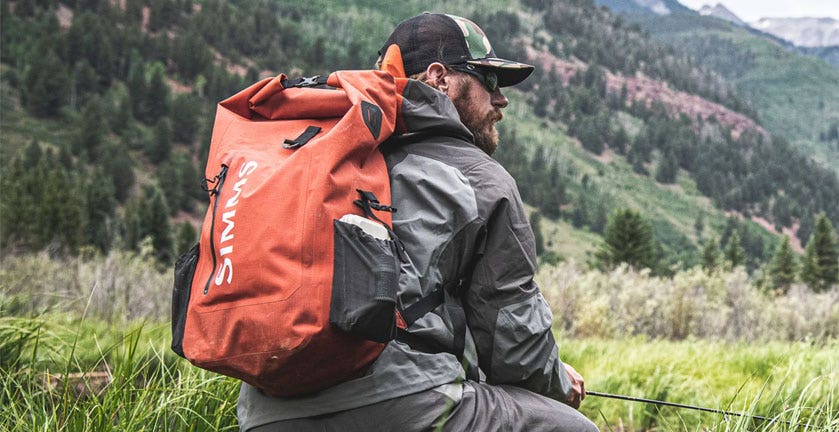 SIMMS DRY CREEK ROLL TOP BAG IN USE