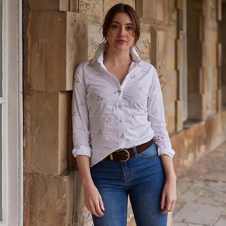 Woman wearing a shirt from our new womenswear collection