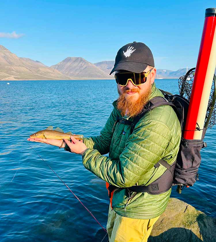 Tom with his Sage Method fly rod Tom with his Sage Method fly rod pictured by the water side with an Artcic Char
