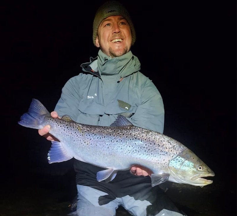 Sea trout night time fishing Coltons pictured with a sea trout caught at night