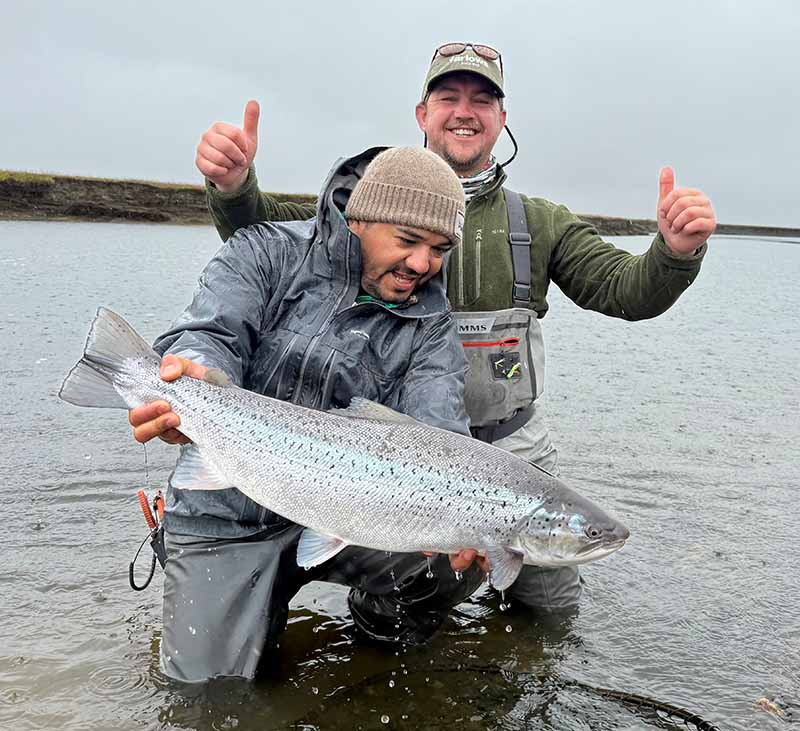 What to expect to catch in Argentina Coltons friend pictured with a sea trout in the water